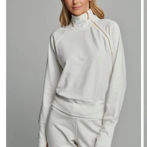 sundays pullover with cute zipper detail.